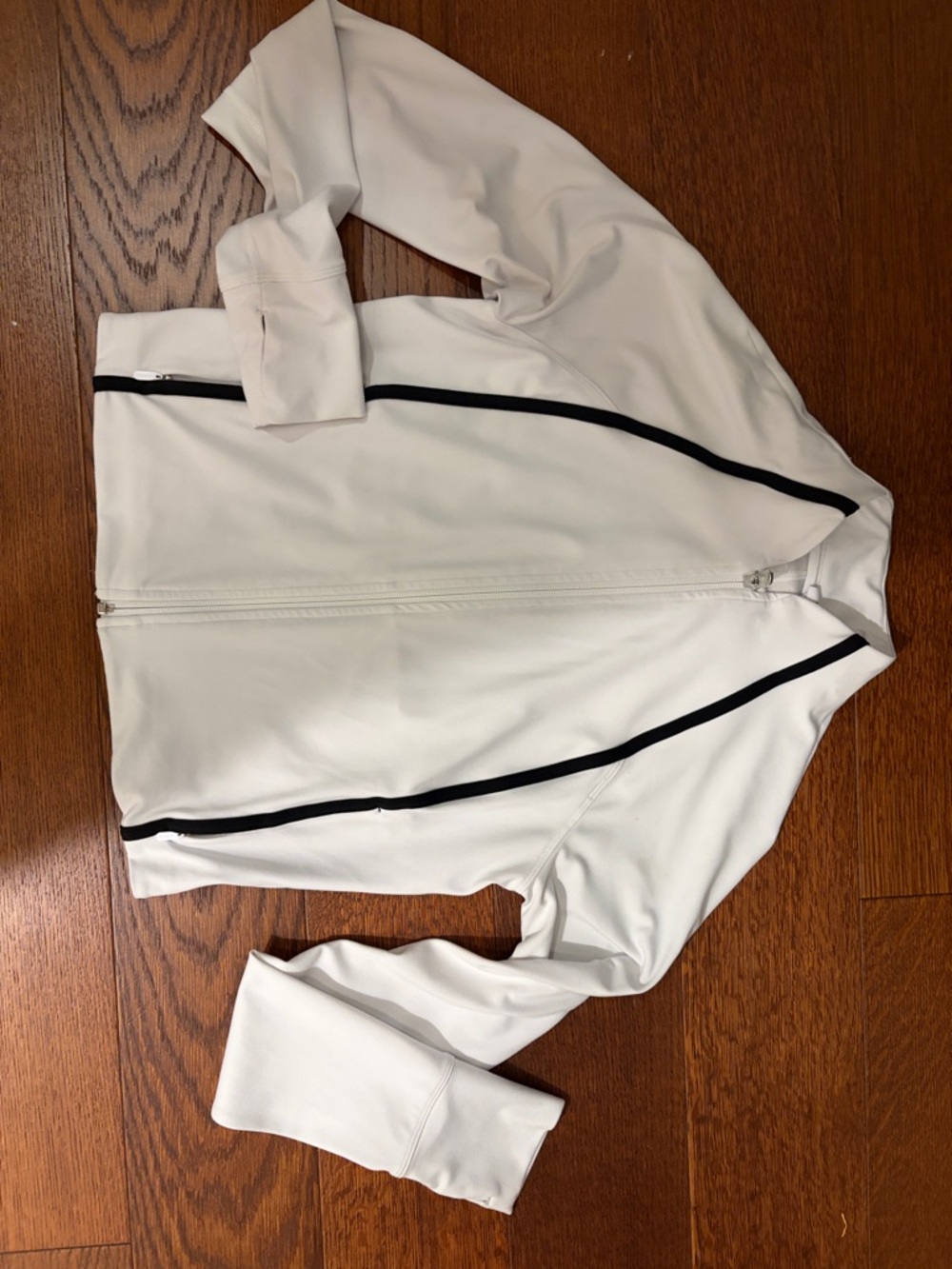Athleta light weight excercise jacket with Black Trim size small/petite.